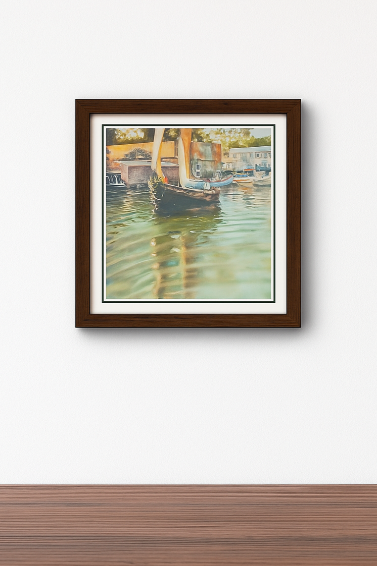 Framed photo of a sailboat in a harbor with beige sails, compact 8.5 x 8.5 inch wall art in a wooden frame.