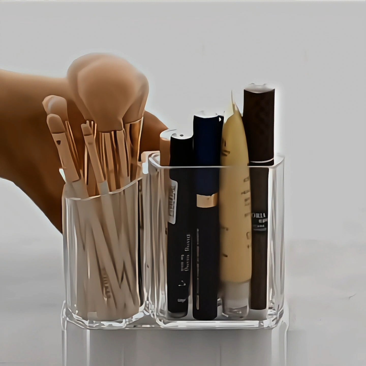makeup brush holder with brushes and beauty sponge neatly organized
